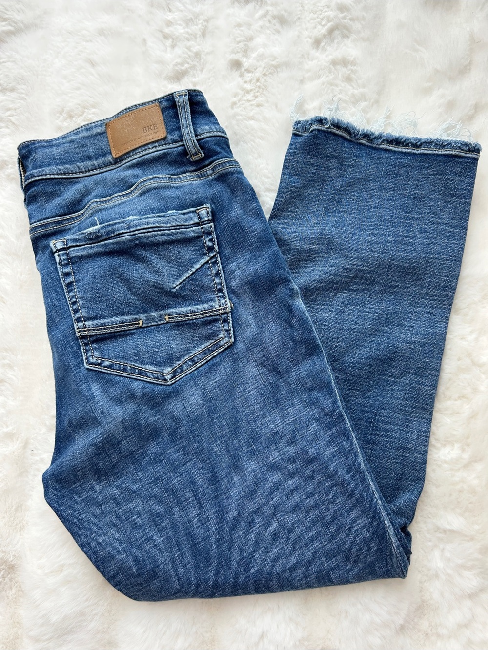 Buckle Raw Hem Blue Cropped Jeans